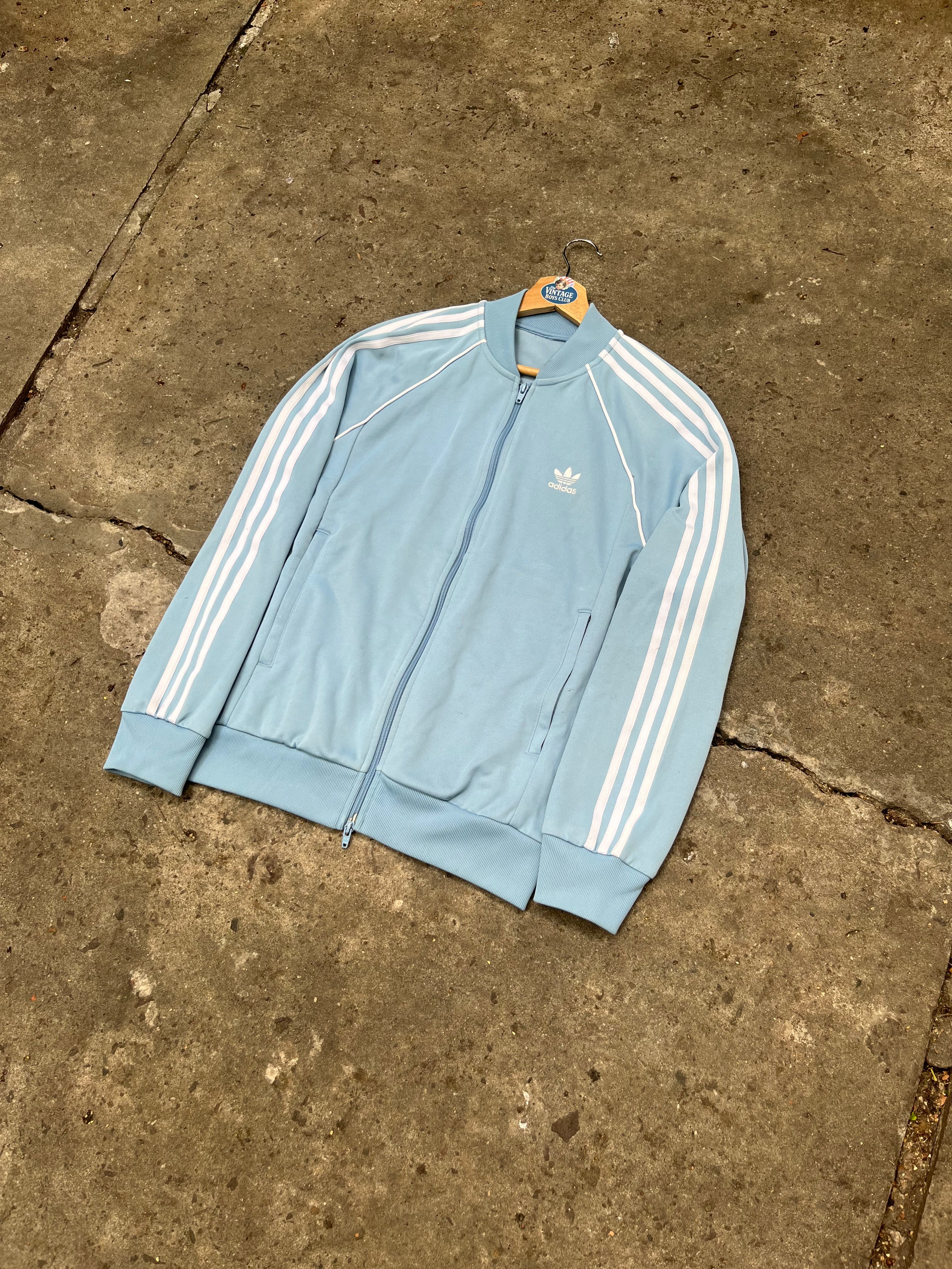 Campera Adidas sst Celeste Original