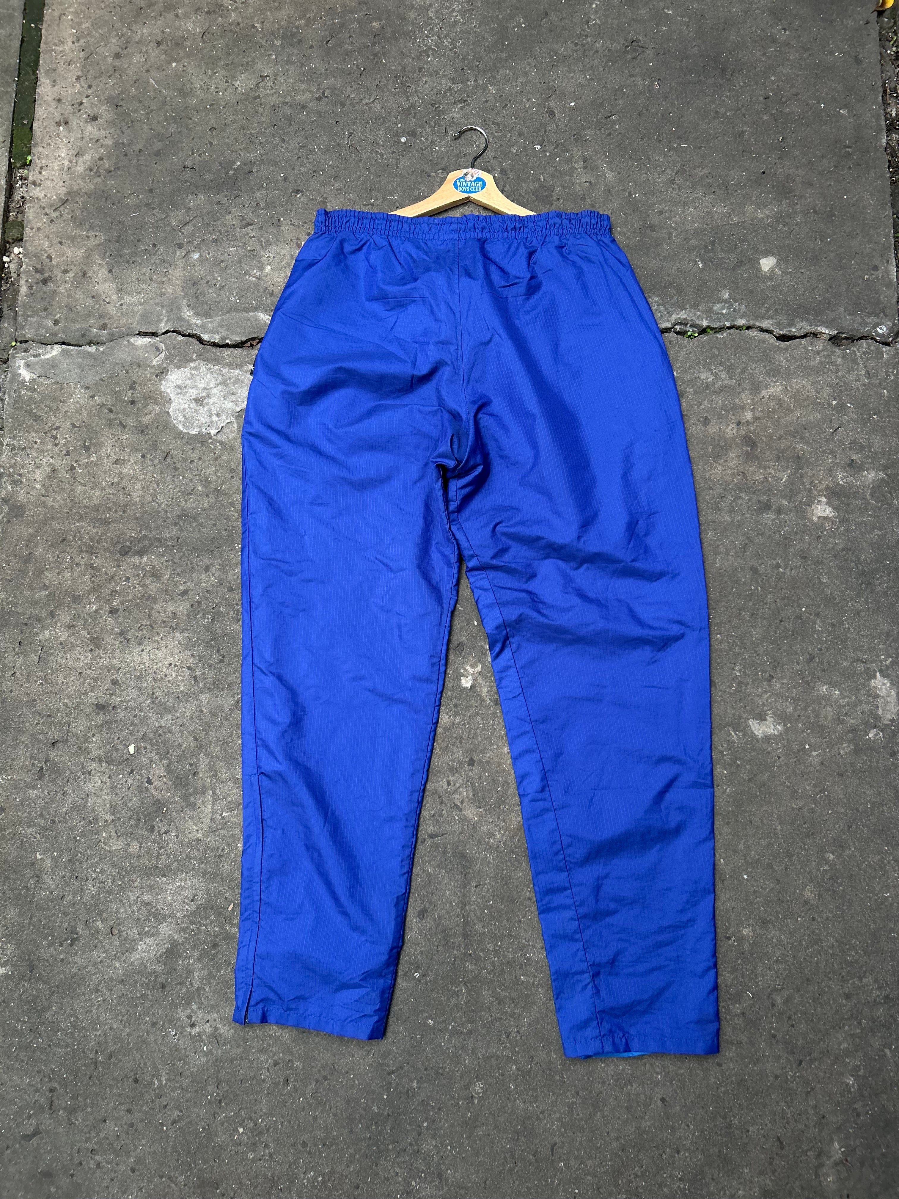 Pantalón Asics Rompeviento Original
