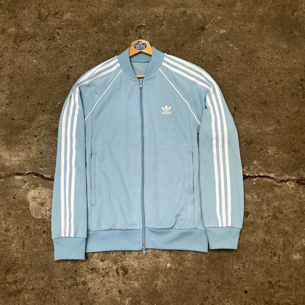 Campera Adidas sst Celeste Original