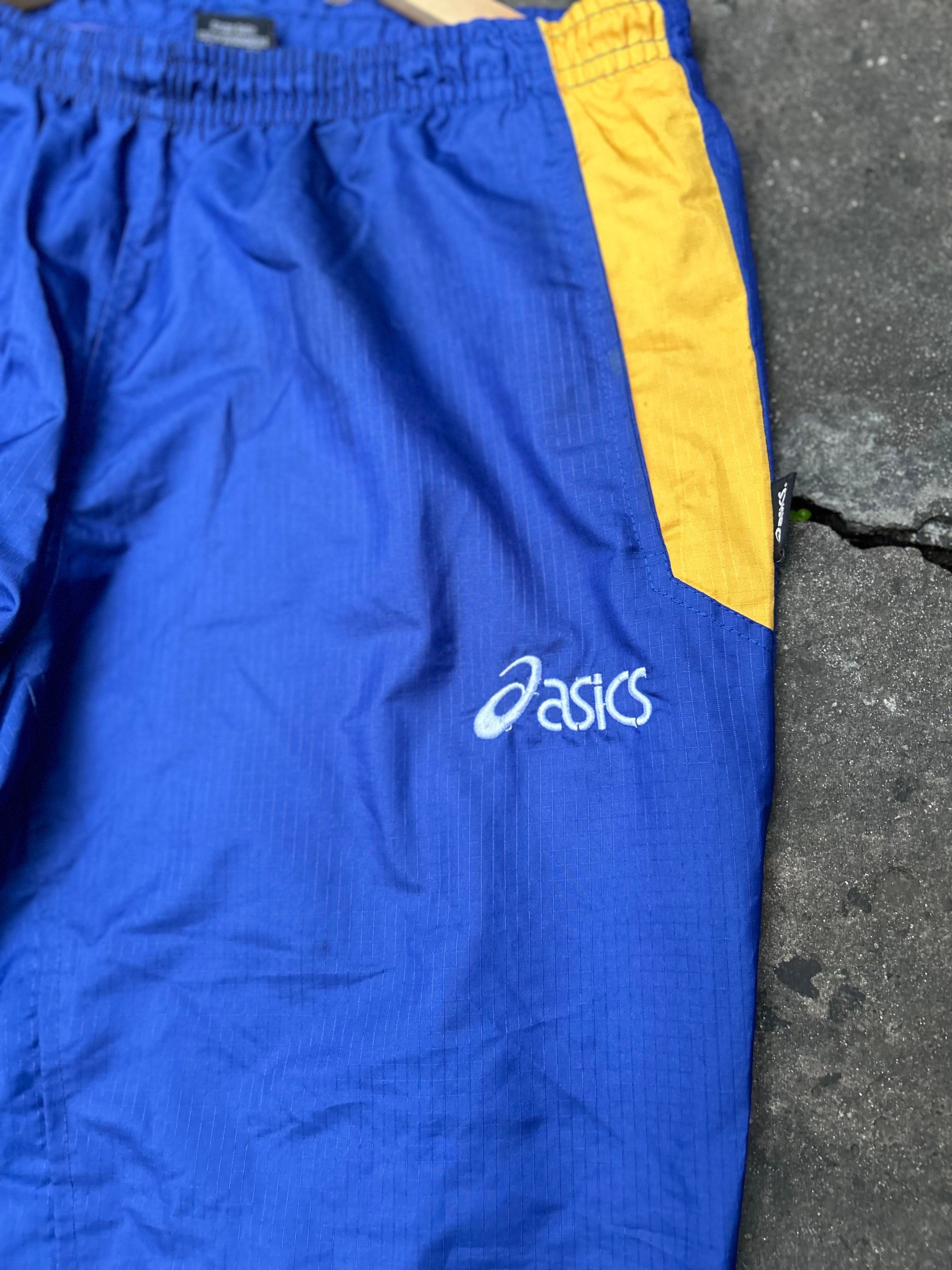 Pantalón Asics Rompeviento Original