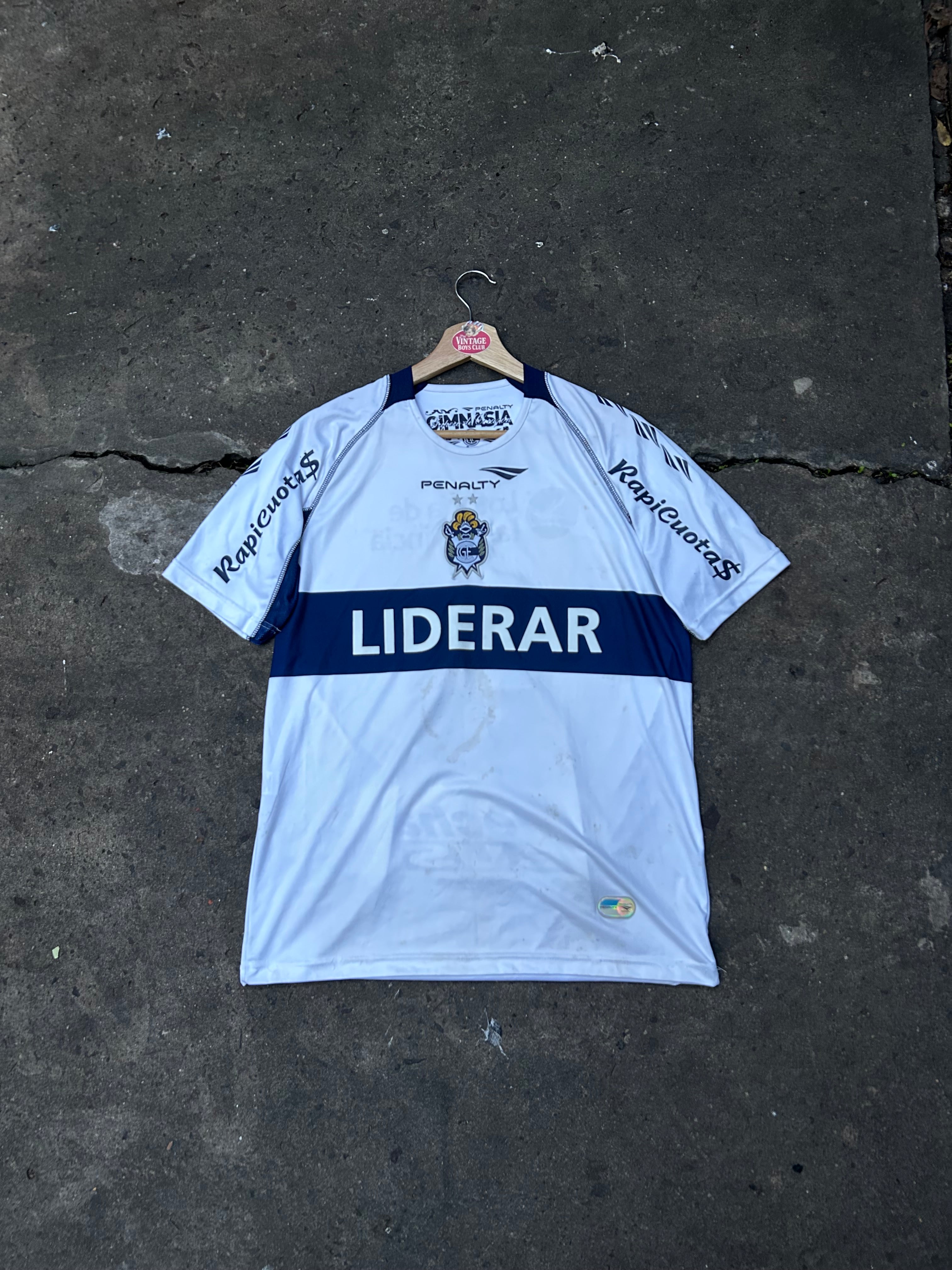 Camiseta Gimnasia Penalty 2012 de Juego