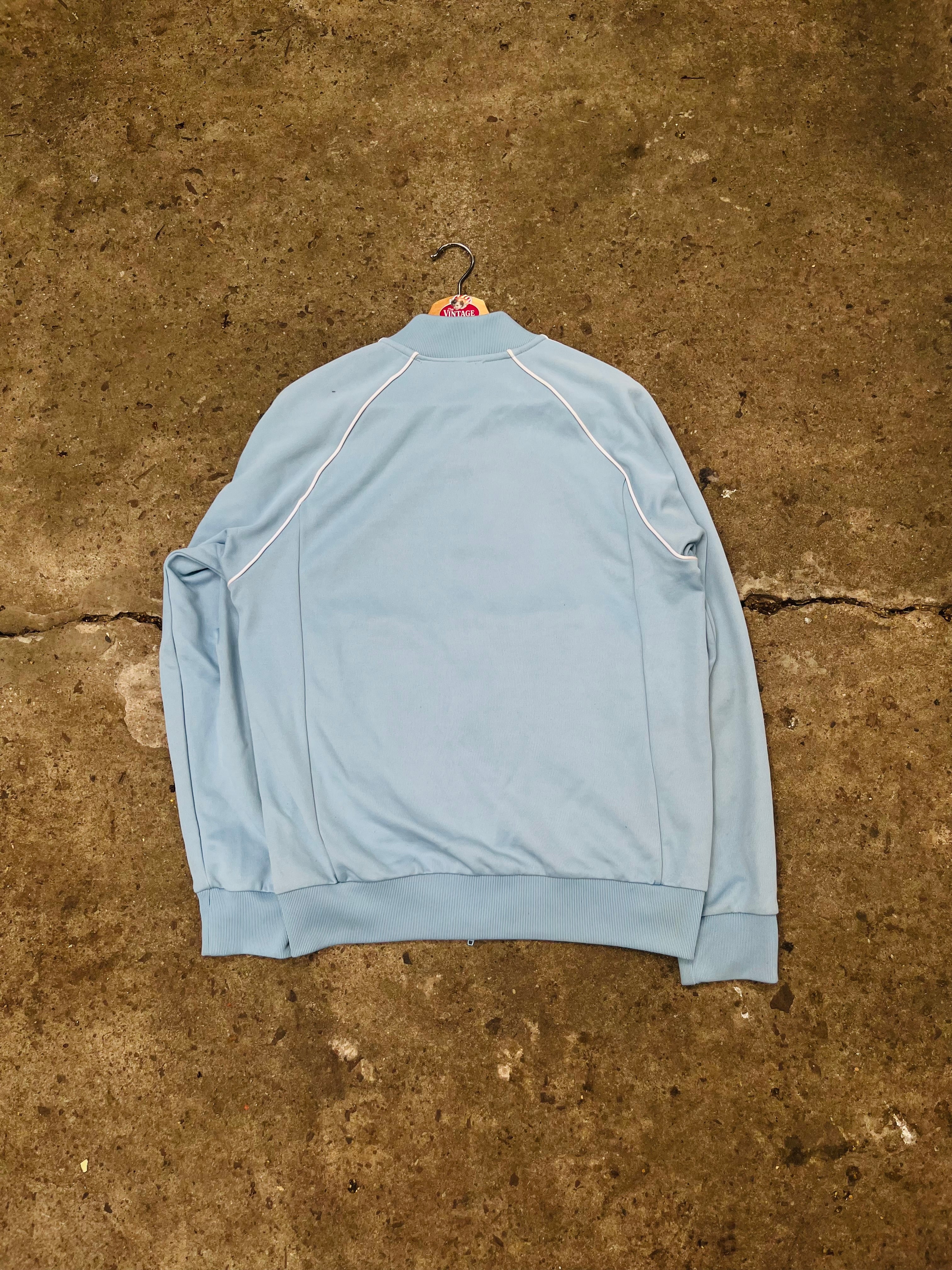 Campera Adidas sst Celeste Original